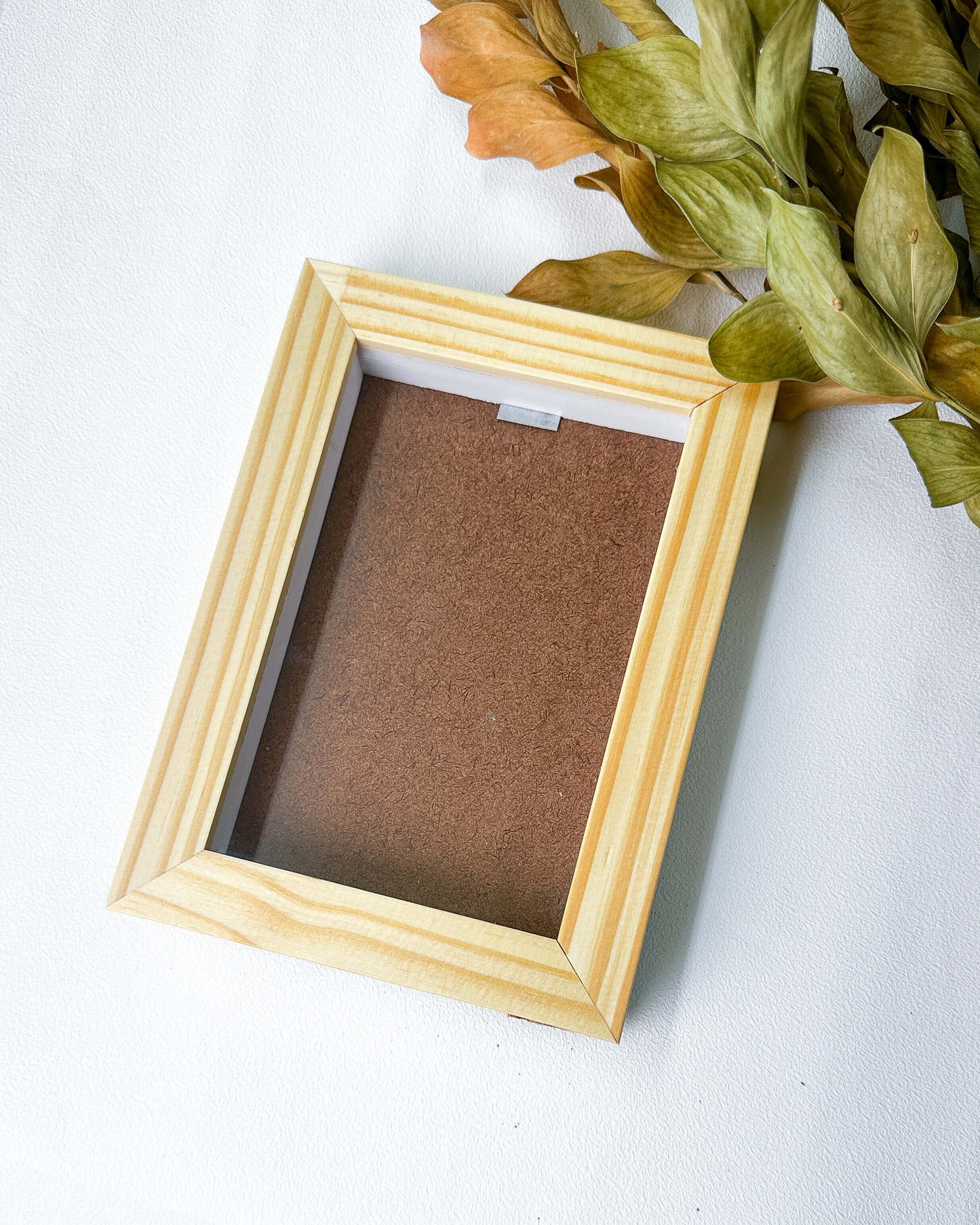 Moldura com vidro caixa alta natural